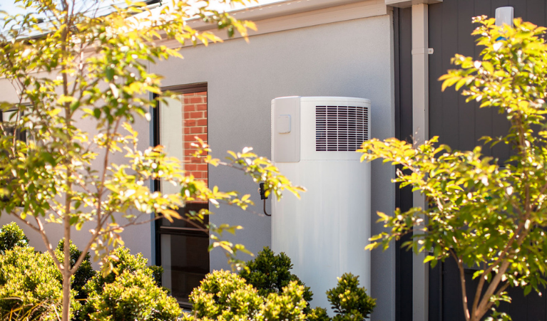 solar hot water appliance near the home wall